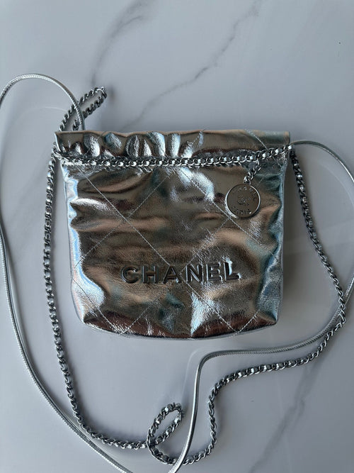 CHANEL MINI 20 BAG IN SILVER METALLIC LAMBSKIN