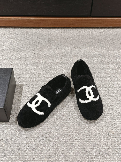 CHANEL LOAFERS IN BLACK FLEECE WITH WHITE LOGO